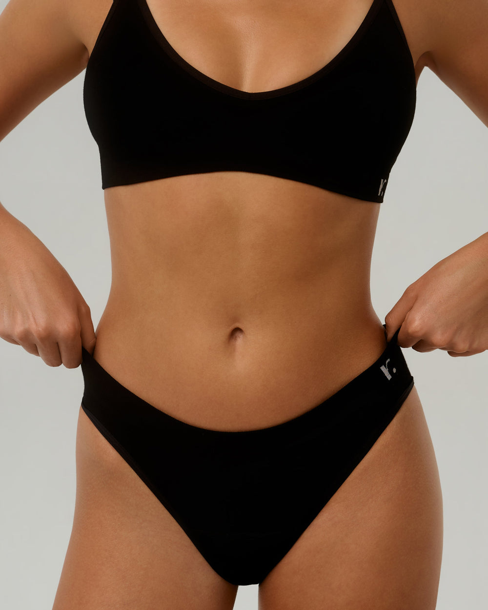 Close-up of Rudie Leakproof Period Brief on model — soft bamboo viscose mid-rise fit