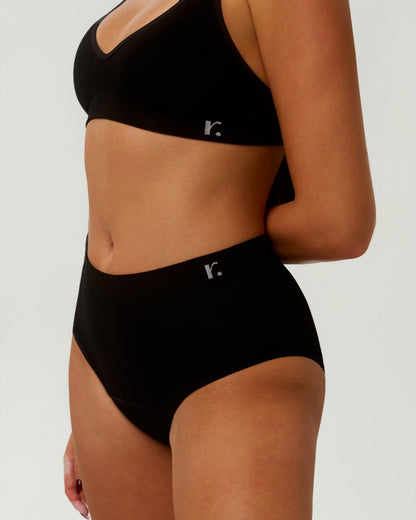 Close-up of Rudie Leakproof High-Waist Brief in black — half-body zoomed detail of bamboo fabric