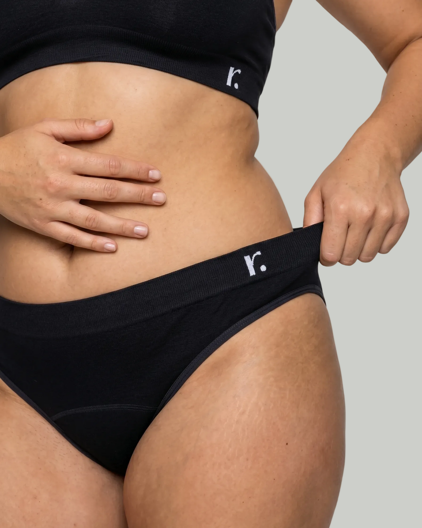 Rudie black bamboo seamless period brief — angled product shot showing soft mid-rise waistband